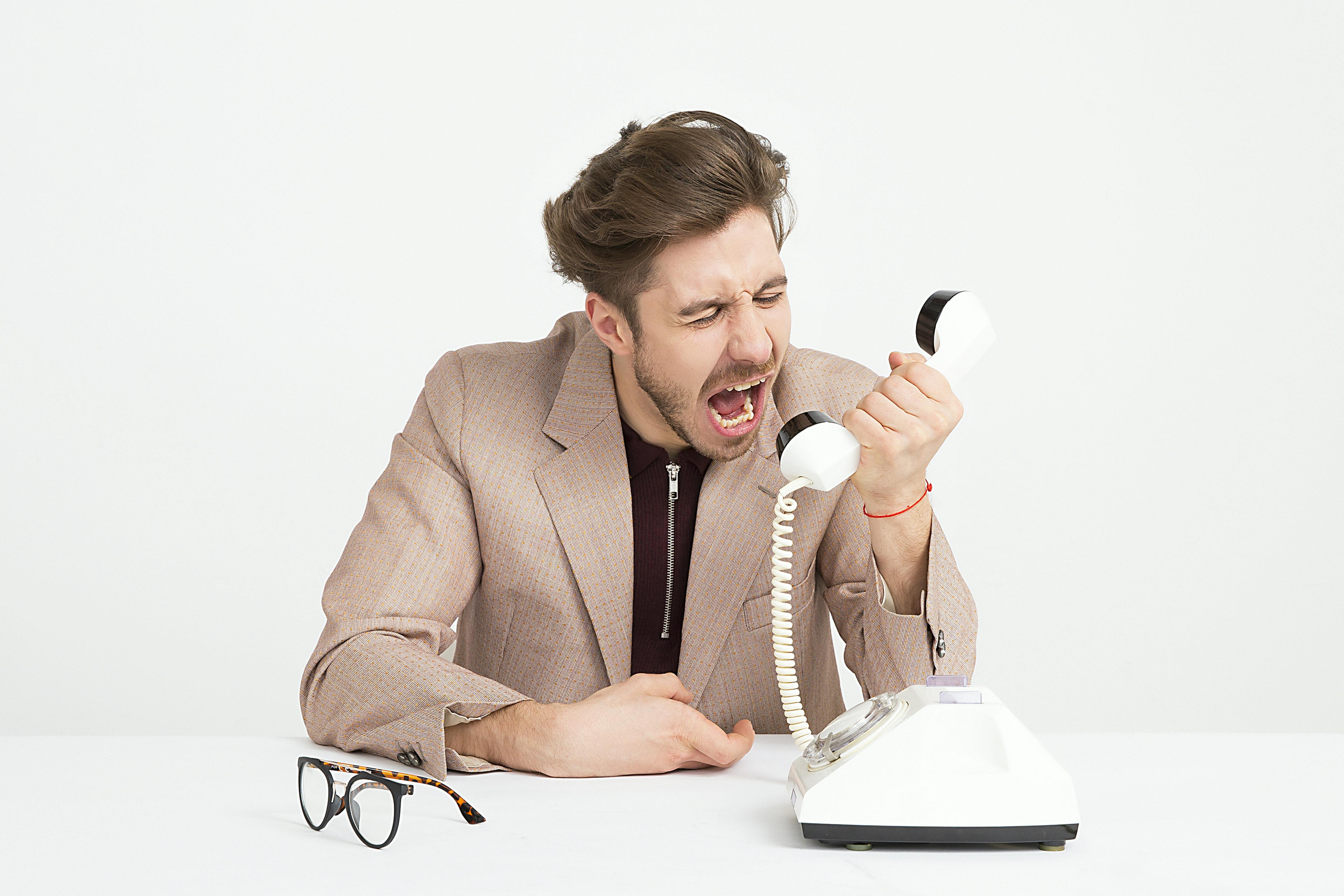 yelling into phone support